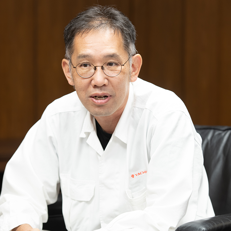 本間 晋 氏